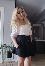 Ukrainian mail order bride Karlygash from Almaty with blonde hair and brown eye color - image 8