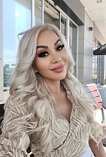 Ukrainian mail order bride Karlygash from Almaty with blonde hair and brown eye color - image 2