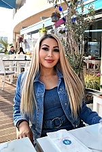 Ukrainian mail order bride Karlygash from Almaty with blonde hair and brown eye color - image 7