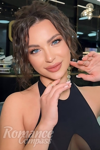 Ukrainian mail order bride Yana from Kyiv with brunette hair and blue eye color - image 1