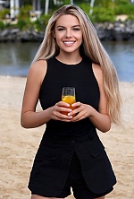 Ukrainian mail order bride Lyudmila from Kyiv with blonde hair and green eye color - image 6