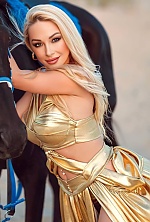 Ukrainian mail order bride Olena from Kyiv with blonde hair and green eye color - image 5