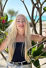 Ukrainian mail order bride Olena from Kyiv with blonde hair and green eye color - image 7