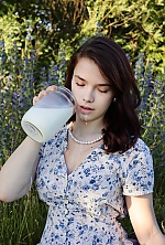 Ukrainian mail order bride Daryna from Ivano-Frankivsk with light brown hair and green eye color - image 15