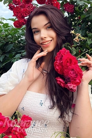 Ukrainian mail order bride Daryna from Ivano-Frankivsk with light brown hair and green eye color - image 1