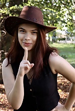 Ukrainian mail order bride Daryna from Ivano-Frankivsk with light brown hair and green eye color - image 21