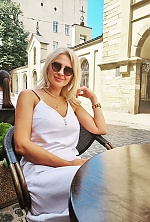 Ukrainian mail order bride Eva from Dubai with blonde hair and hazel eye color - image 2