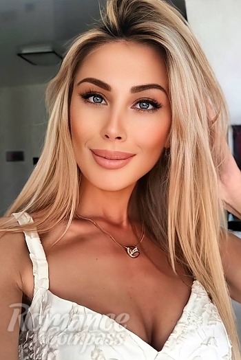 Ukrainian mail order bride Anna from Kyiv with blonde hair and grey eye color - image 1