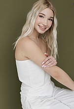 Ukrainian mail order bride Svitlana from Kyiv with blonde hair and green eye color - image 8