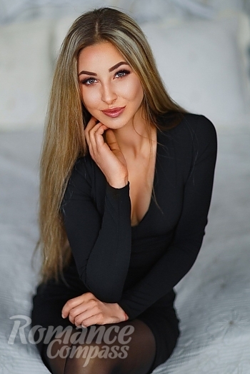 Ukrainian mail order bride Anhelina from Kyiv with blonde hair and green eye color - image 1