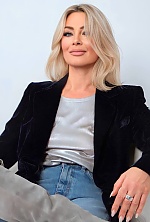 Ukrainian mail order bride Olena from Kyiv with blonde hair and blue eye color - image 7