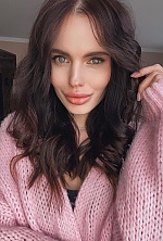 Ukrainian mail order bride Liliya from Lviv with black hair and green eye color - image 9