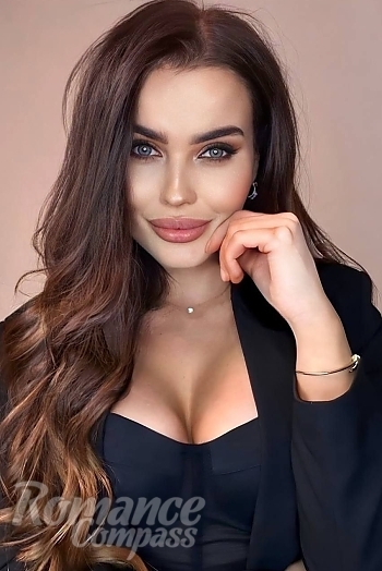 Ukrainian mail order bride Liliya from Lviv with black hair and green eye color - image 1