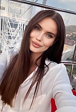 Ukrainian mail order bride Liliya from Lviv with black hair and green eye color - image 3