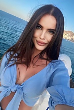 Ukrainian mail order bride Liliya from Lviv with black hair and green eye color - image 4