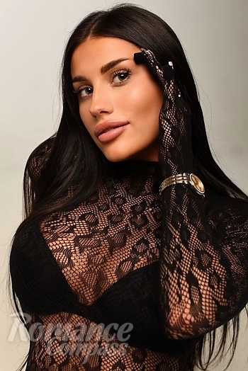 Ukrainian mail order bride Polina from Kyiv with black hair and green eye color - image 1