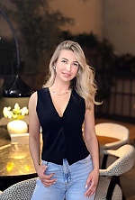 Ukrainian mail order bride Yuliya from Odesa with light brown hair and green eye color - image 8