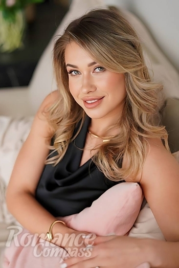 Ukrainian mail order bride Yuliya from Odesa with light brown hair and green eye color - image 1