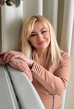 Ukrainian mail order bride Svetlana from Dnipro with blonde hair and green eye color - image 4