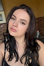 Ukrainian mail order bride Inna from Kropivnitskiy with black hair and brown eye color - image 9