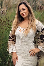 Ukrainian mail order bride Anastasiia from Kyiv with light brown hair and blue eye color - image 9