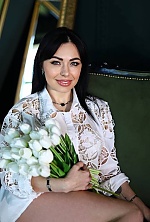 Ukrainian mail order bride Tetiana from Mykolayiv with black hair and green eye color - image 8