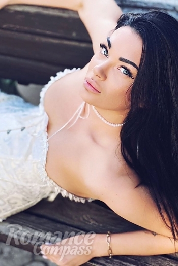 Ukrainian mail order bride Alina from Zaporizhzhya with black hair and blue eye color - image 1