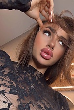 Ukrainian mail order bride Elizaveta from Kyiv with brunette hair and hazel eye color - image 23