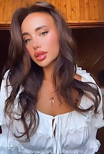 Ukrainian mail order bride Elizaveta from Kyiv with brunette hair and hazel eye color - image 11