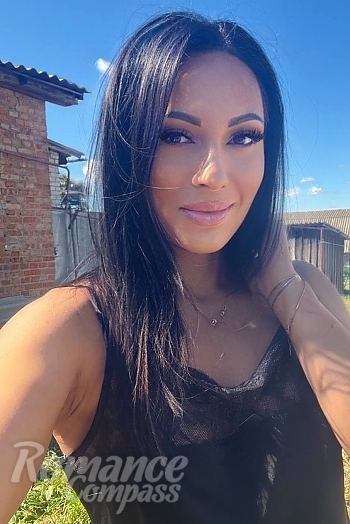 Ukrainian mail order bride Ludmila from Kamyanets-Podilskyi with black hair and brown eye color - image 1