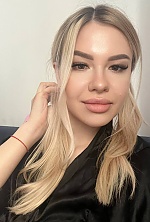 Ukrainian mail order bride Yulia from Vienna with blonde hair and hazel eye color - image 3