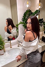 Ukrainian mail order bride Elizaveta from Odesa with black hair and green eye color - image 6