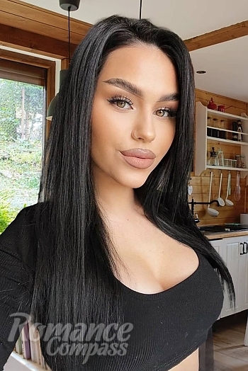 Ukrainian mail order bride Elizaveta from Odesa with black hair and green eye color - image 1