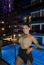 Ukrainian mail order bride Elizaveta from Odesa with black hair and green eye color - image 14