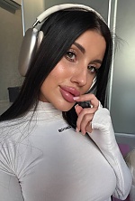 Ukrainian mail order bride Polina from Odesa with black hair and green eye color - image 15