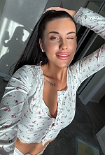 Ukrainian mail order bride Polina from Odesa with black hair and green eye color - image 12
