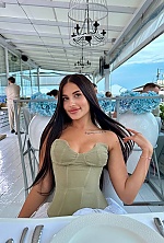 Ukrainian mail order bride Polina from Odesa with black hair and green eye color - image 10