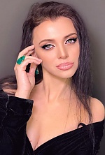 Ukrainian mail order bride Anastasia from Astana with black hair and green eye color - image 4