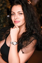 Ukrainian mail order bride Anastasia from Astana with black hair and green eye color - image 8
