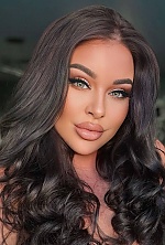 Ukrainian mail order bride Vasilisa from Kyiv with black hair and green eye color - image 3