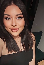 Ukrainian mail order bride Vasilisa from Kyiv with black hair and green eye color - image 5