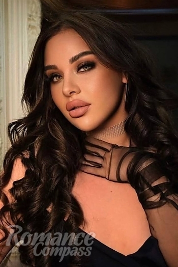 Ukrainian mail order bride Vasilisa from Kyiv with black hair and green eye color - image 1