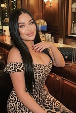 Ukrainian mail order bride Vasilisa from Kyiv with black hair and green eye color - image 9