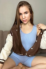 Ukrainian mail order bride Hanna from Lviv with light brown hair and blue eye color - image 2