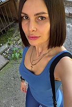 Ukrainian mail order bride Iryna from Mykolayiv with brunette hair and brown eye color - image 11
