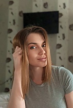 Ukrainian mail order bride Iryna from Odesa with light brown hair and green eye color - image 7