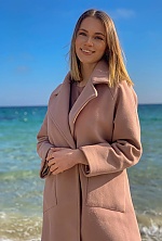 Ukrainian mail order bride Iryna from Odesa with light brown hair and green eye color - image 4