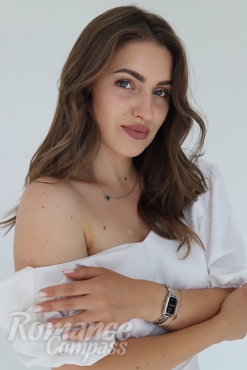 Ukrainian mail order bride Anastasiia from Kalush with light brown hair and blue eye color - image 1