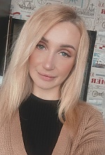 Ukrainian mail order bride Irina from Kyiv with blonde hair and blue eye color - image 9
