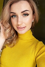 Ukrainian mail order bride Irina from Kyiv with blonde hair and blue eye color - image 4